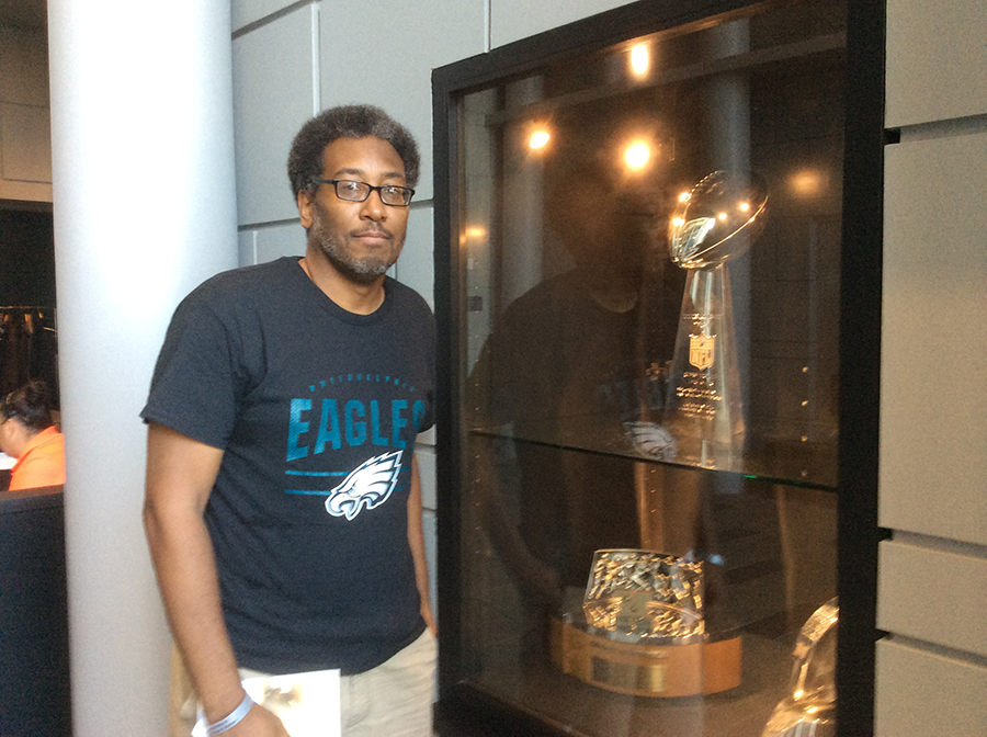 John with the Vince Lombardi Super Bowl 52 trophy at the NovaCare Center